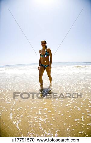 A young girl in the water View Large Photo Image Stock Image - A young girl in the water. Fotosearch
