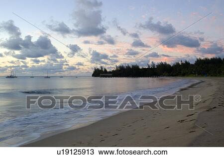 Stock Image - Beach at Hanalei Bay Princeville Kauai Hawaii USA. Fotosearch
