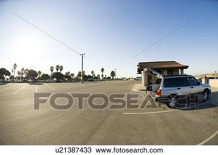 Stock Image - Car with surfboard. Fotosearch