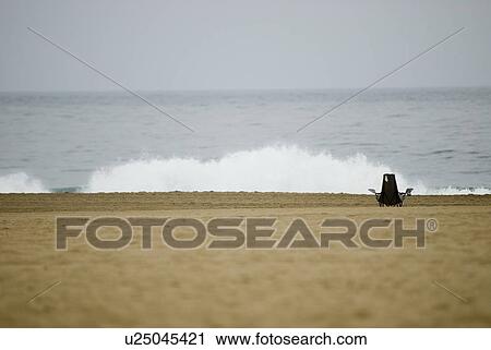 Chair on the coastline View Large Photo Image Stock Image - Chair on the coastline. Fotosearch