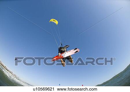 Extreme kite surfer in the air View Large Photo Image Stock Image - Extreme kite surfer in the air. Fotosearch
