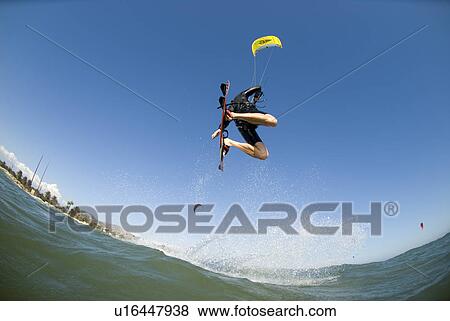 Extreme kite surfer in the air View Large Photo Image Stock Photo - Extreme kite surfer in the air. Fotosearch