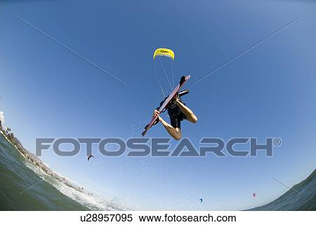 Extreme kite surfer in the air View Large Photo Image Stock Photography - Extreme kite surfer in the air. Fotosearch