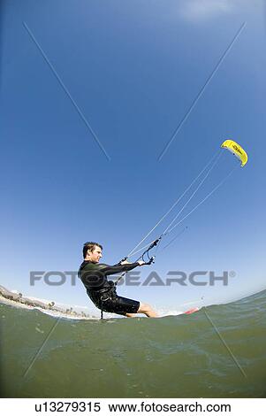 Extreme kite surfer View Large Photo Image Stock Photography - Extreme kite surfer. Fotosearch