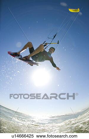 Extreme kite surfer View Large Photo Image Stock Photography - Extreme kite surfer. Fotosearch