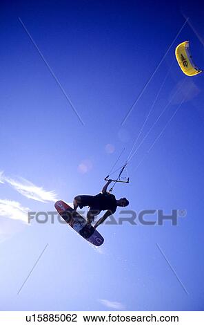 Stock Image - Kite Surfer getting some air Leo Carrillo State Beach California USA. Fotosearch