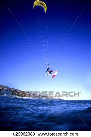 Stock Photo - Kite Surfer in the air. Fotosearch