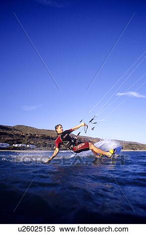 Stock Image - Kite Surfer kite surfing Leo Carrillo State Beach California USA. Fotosearch