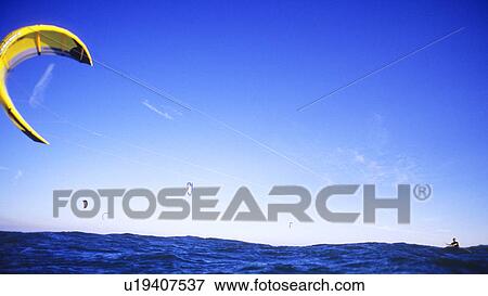 Stock Photo - Kite Surfer kite surfing Leo Carrillo State Beach California USA. Fotosearch