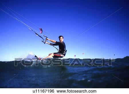 Kite Surfer passing by View Large Photo Image Stock Photograph - Kite Surfer passing by. Fotosearch