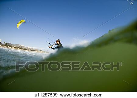 Kite surfer View Large Photo Image Stock Photo - Kite surfer. Fotosearch