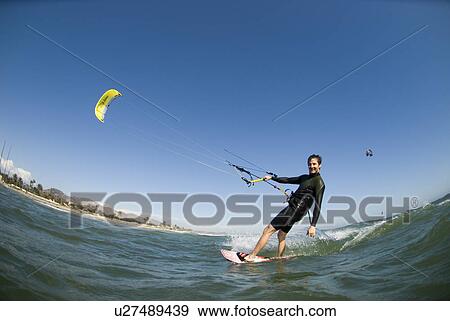 Kite surfer View Large Photo Image Stock Photo - Kite surfer. Fotosearch