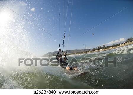 Kite surfing View Large Photo Image Stock Image - Kite surfing. Fotosearch