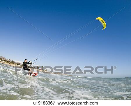 Kite surfing View Large Photo Image Stock Photo - Kite surfing. Fotosearch