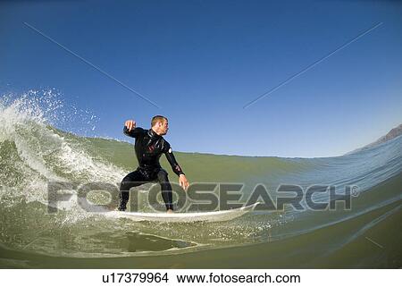 Male surfer View Large Photo Image Picture - Male surfer. Fotosearch