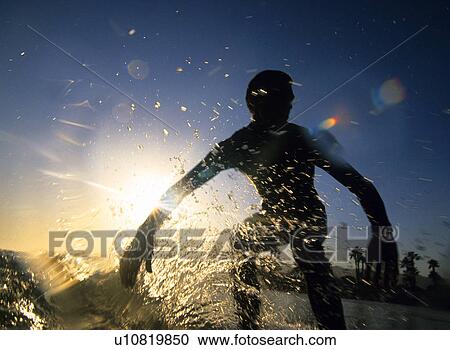 Stock Image - Male surfer. Fotosearch