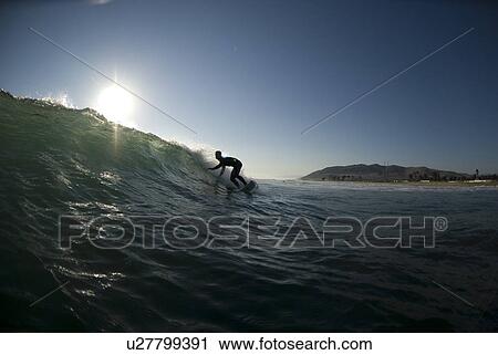 Male surfer surfing View Large Photo Image Stock Image - Male surfer surfing. Fotosearch