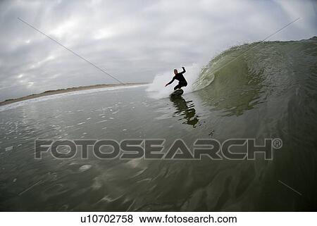 Male surfing View Large Photo Image Stock Photo - Male surfing. Fotosearch