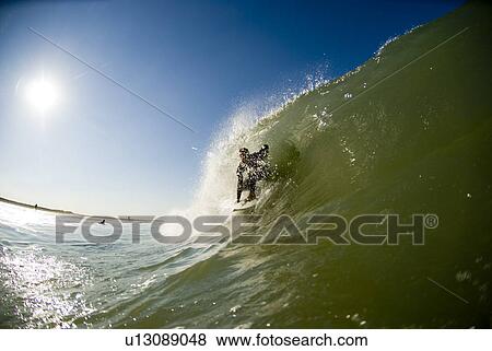 Male surfing View Large Photo Image Stock Photo - Male surfing. Fotosearch