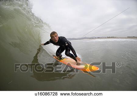 Male surfing View Large Photo Image Stock Photo - Male surfing. Fotosearch