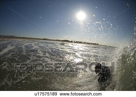 Male surfing View Large Photo Image Stock Photo - Male surfing. Fotosearch