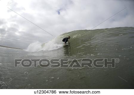 Male surfing View Large Photo Image Stock Photograph - Male surfing. Fotosearch