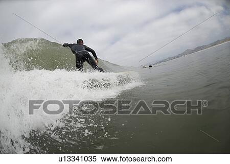 Male surfing View Large Photo Image Stock Photography - Male surfing. Fotosearch