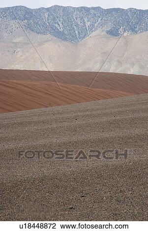 Stock Image - Mountains and valleys. Fotosearch