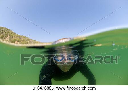 Person underwater View Large Photo Image Stock Photography - Person underwater. Fotosearch