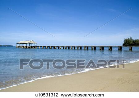 Stock Image - Pier at Hanalei Bay Princeville Kauai Hawaii USA. Fotosearch