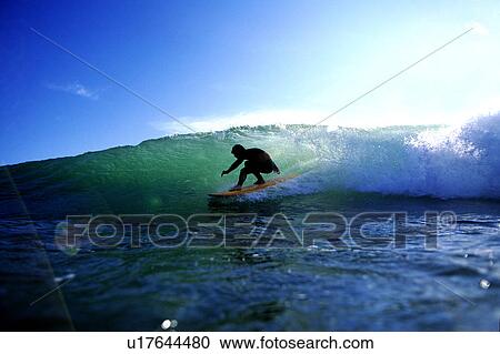 Stock Image - Professional surfer. Fotosearch