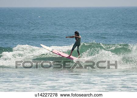 Stock Photo - Professional surfer. Fotosearch