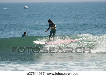 Stock Photo - Professional surfer. Fotosearch