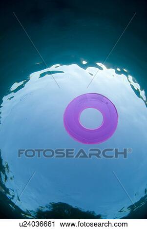 Raft floating in a pool View Large Photo Image Stock Image - Raft floating in a pool. Fotosearch