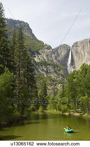 Stock Image - Rafting down river. Fotosearch