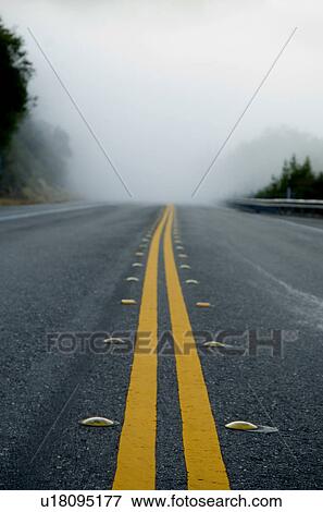 Stock Photo - Road with fog on it. Fotosearch