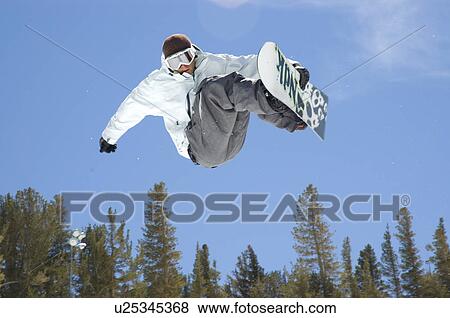 Stock Photo - Snowboarding jump. Fotosearch