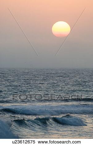 Sunset over water View Large Photo Image Stock Photography - Sunset over water. Fotosearch