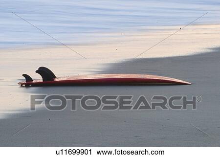 Stock Image - Surfboard on the beach. Fotosearch