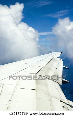 The view out an airplane window. View Large Photo Image Stock Photo - The view out an airplane window.. Fotosearch