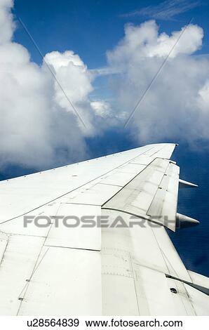Stock Photo - The view out an airplane window. Fotosearch