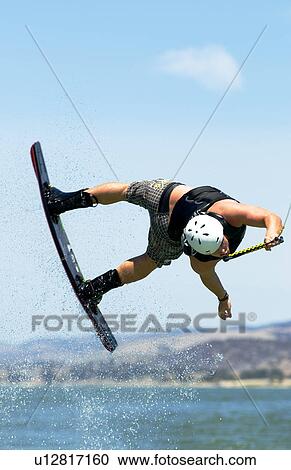 Wakeboarder in flip View Large Photo Image Stock Image - Wakeboarder in flip. Fotosearch