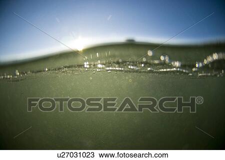 Stock Image - Water with a blue sky. Fotosearch