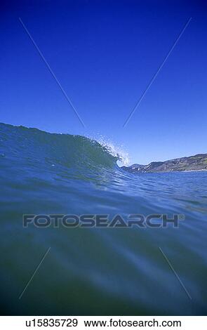 Wave breaking View Large Photo Image Stock Photo - Wave breaking. Fotosearch