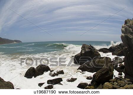 Stock Image - Waves and rocks. Fotosearch