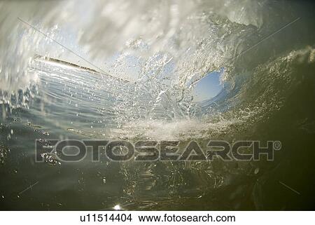 Picture - Waves breaking in the ocean. Fotosearch