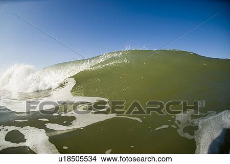 Picture - Waves breaking in the ocean. Fotosearch