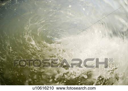 Waves breaking in the ocean View Large Photo Image Stock Image - Waves breaking in the ocean. Fotosearch