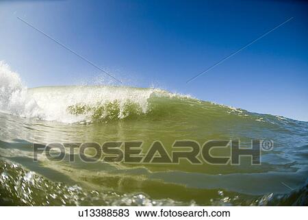 Waves breaking in the ocean View Large Photo Image Stock Image - Waves breaking in the ocean. Fotosearch