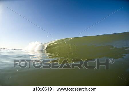 Waves breaking in the ocean View Large Photo Image Stock Image - Waves breaking in the ocean. Fotosearch